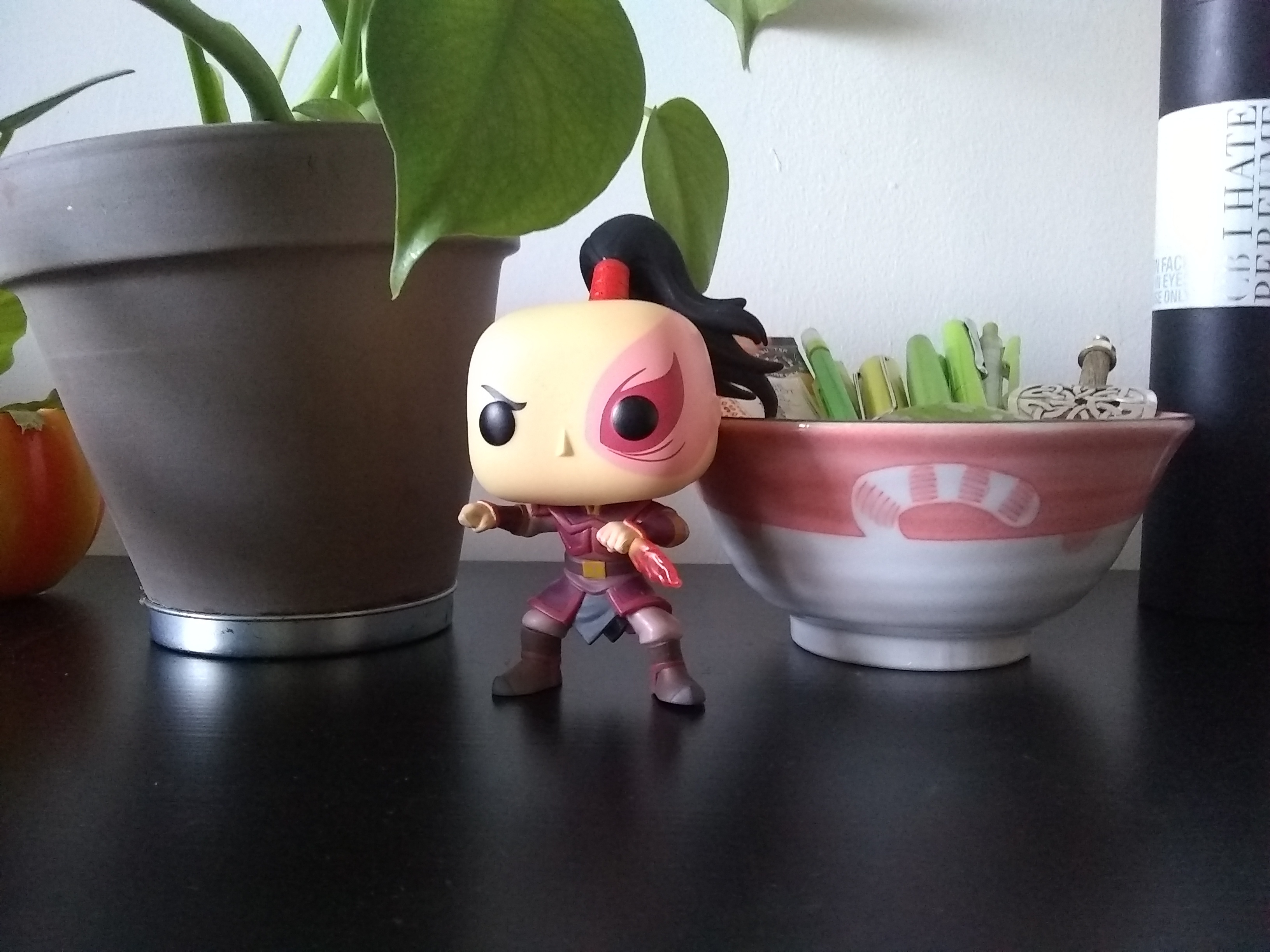 A Zuko FuncoPop on a desk.